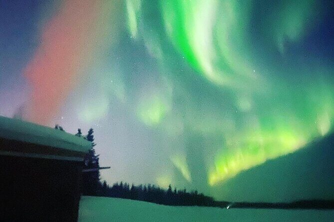 "Aurora Ice" - Ice Fishing & Salmon Dinner Tour - Aurora viewing through panorama windows: where the magic happens
