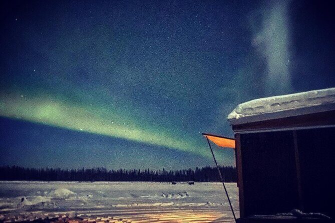 "Aurora Ice" - Ice Fishing & Salmon Dinner Tour - Guide style that turns a winter task into a story night